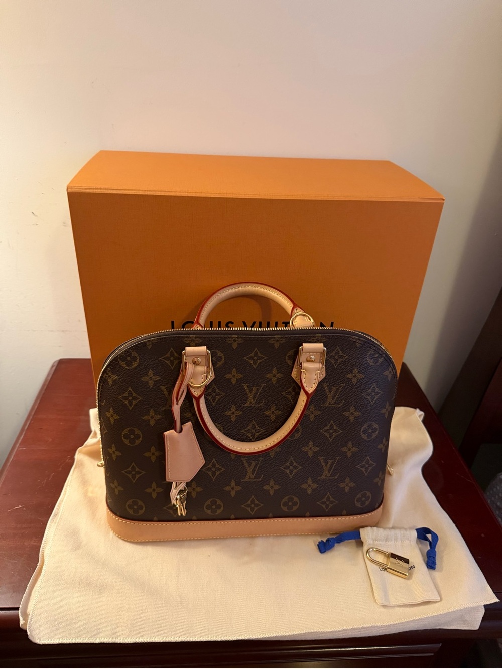 Louis Vuitton Monogram Alma Satchel in Brown and Tan